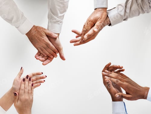 Preview: Business people clapping hands together