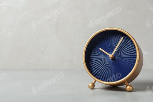 Preview: Alarm clock on grey background. Time management