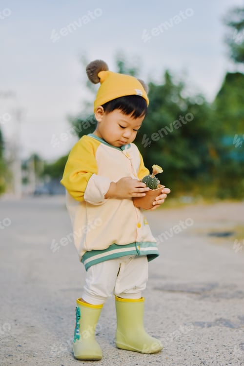 Preview: Little boy and cactus