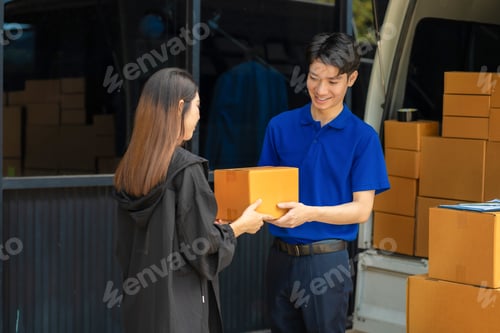 Preview: Asian delivery man deliver box parcel package to customer, shipping delivery concept.