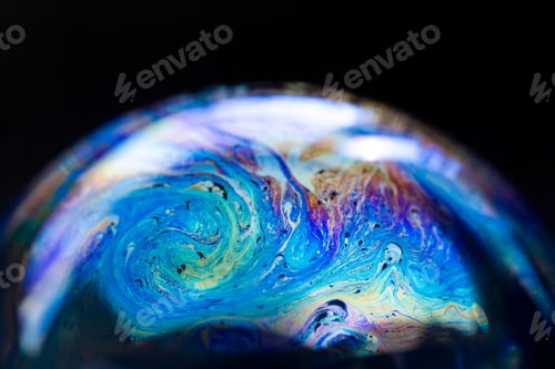 Preview: Abstract pattern, multicolored texture inside of the soap bubble, macro photography