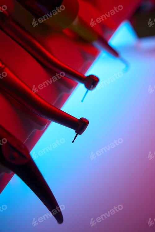 Preview: Cropped photo of dentist block with drill. Treatment, brushing, prosthetics