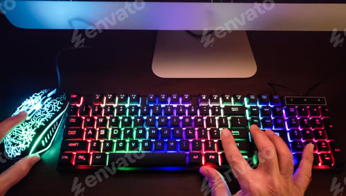 Preview: Neon lit computer keyboard helps at nighttime.