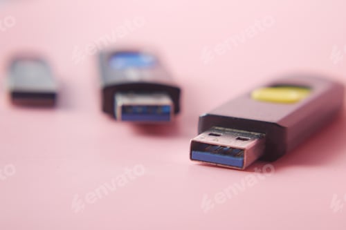 Preview: USB flash drive on blue background close up