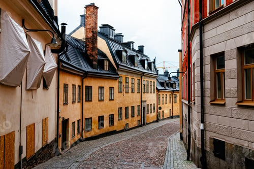 Preview: Picturesque cobblestoned street with colorful houses in Sodermalm in Stockholm