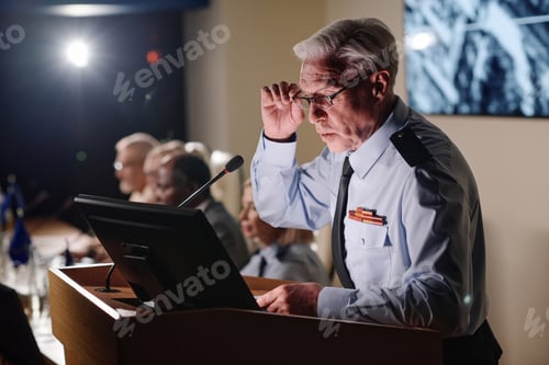 Preview: Politics speaking his report in microphone