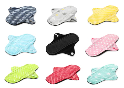 Preview: Set with different cloth menstrual pads on white background