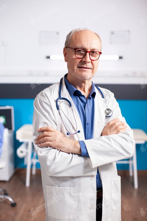 Preview: Elderly medic standing in hospital room
