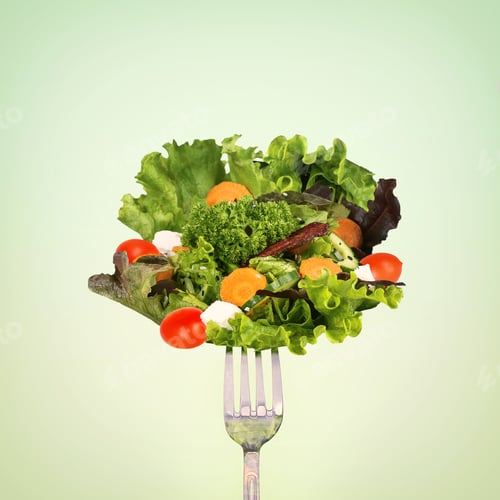 Preview: Eat healthy. A forkful of salad against a green background.