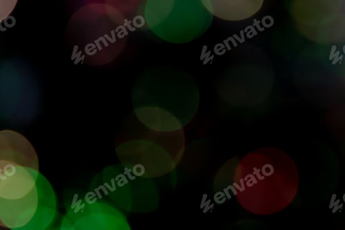 Preview: Dark background with a vibrant display of multicolored bokeh lights.