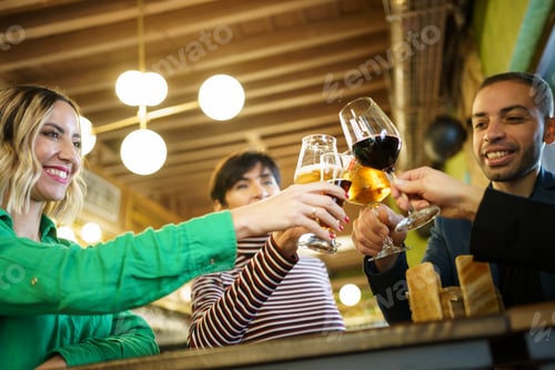 Preview: Man and women proposing toast during party