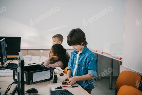 Preview: little kids constructing diy robots, stem education concept
