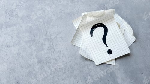 Preview: Question Mark on Paper Sheets with gray Background