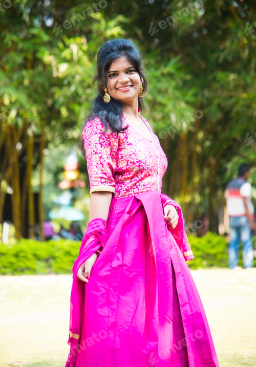 Preview: Outdoor portrait of beautiful young Indian girl in the park