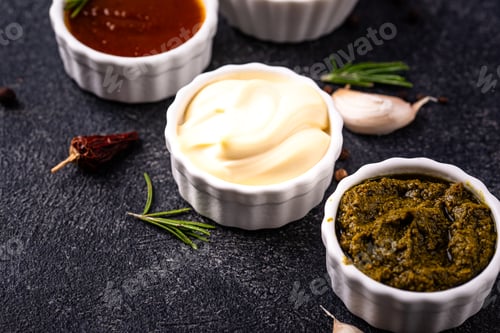 Preview: Set of different sauces. Ketchup, mustard, pesto