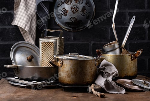 Preview: Old vintage iron pots and metallic dish