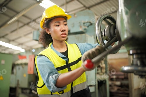 Preview: Female engineers working in industry factory.