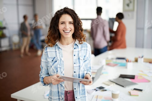 Preview: Creative Woman Smiling in Office