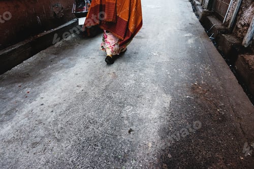 Preview: Rajasthani woman walking in the street