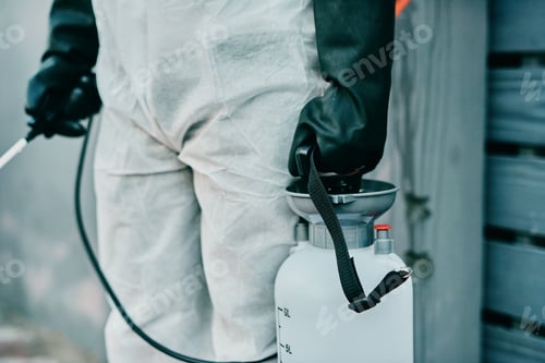 Preview: Shot of a healthcare worker wearing a hazmat suits working to control an outbreak
