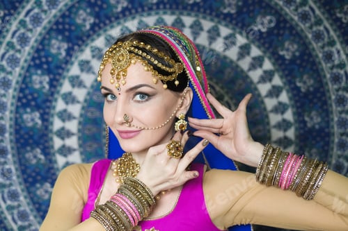 Preview: Woman In Indian Clothes Dancing Belly Dance. Young Beautiful Woman In National Costume Dancing