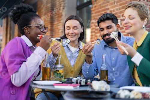 Preview: Friends Eating Sushi Outdoors