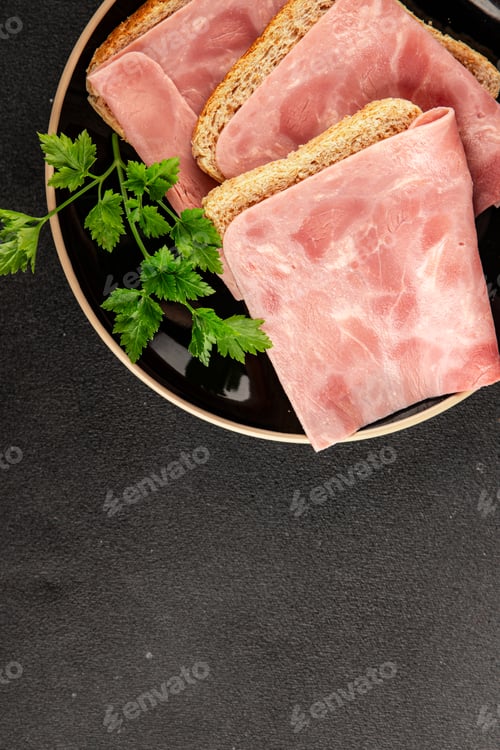 Preview: Ham slices meat spam pork fresh delicious gourmet food background on the table