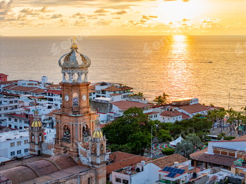 Preview: Aerial view of Our Lady of Guadalupe Church in Puerto Vallarta at sunset
