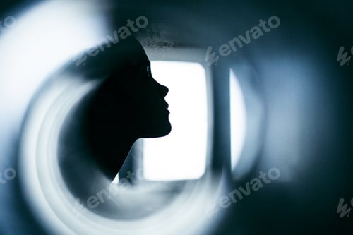 Preview: Portrait of a girl in profile. Abstract female portrait in blue tones