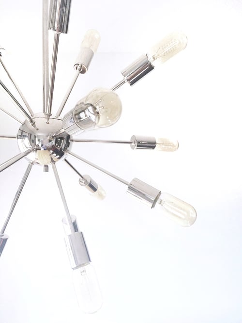 Preview: Mid century atomic Sputnik light fixture interior design neutral chrome