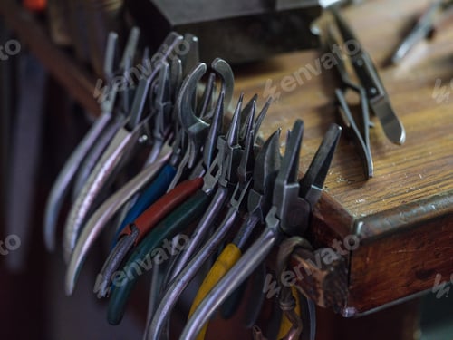 Preview: Set of pliers on wooden workbench