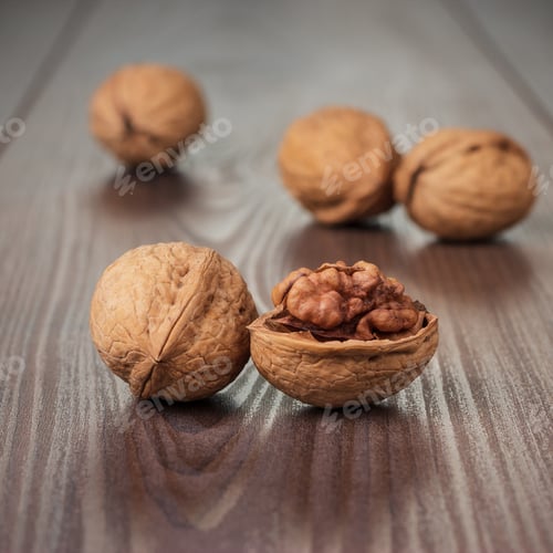 Preview: Walnuts On The Brown Wooden Table