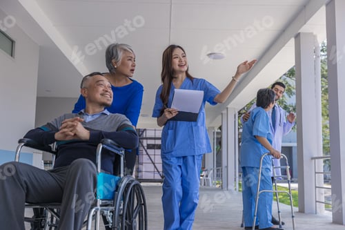 Preview: doctor or nurse helping Senior man to walk at nursing home with walker.