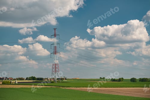 Preview: Power line surrounded by agricultural fields on a cloudy day