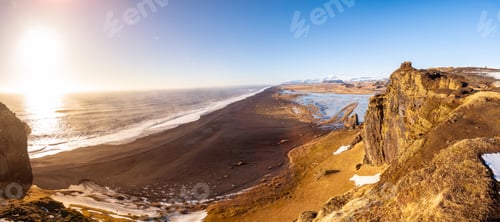 Preview: Panoramic view of Dyrholaey beach in cold winter with snow in Iceland, near Vik