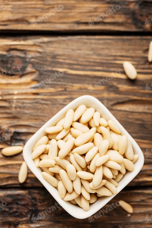 Preview: pine nut on the wooden table