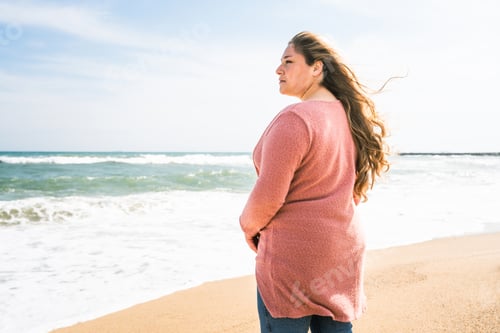 Preview: Beautiful plus size young woman outdoors