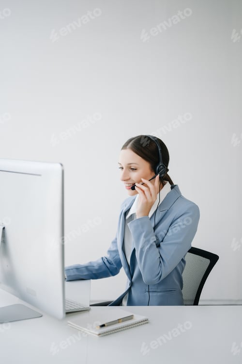 Preview: Serious call center operator in wireless headset talking with customer, woman in headphones with