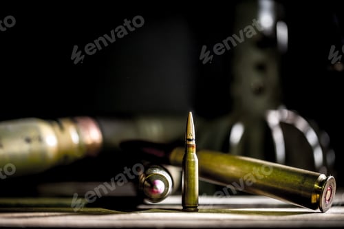 Preview: weapons, cartridge on wooden background