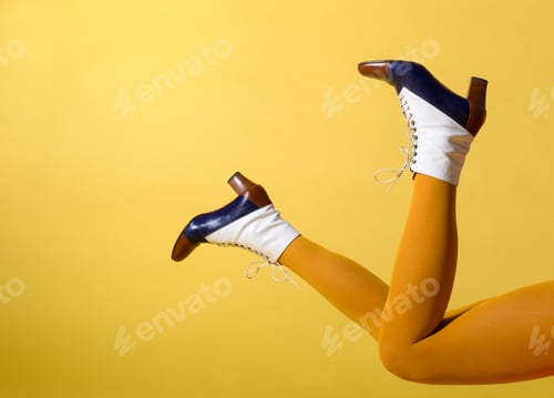Preview: Woman in fashionable retro shoes and tights