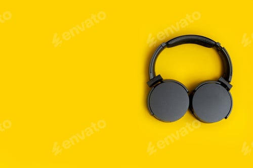 Preview: Headphones on yellow background