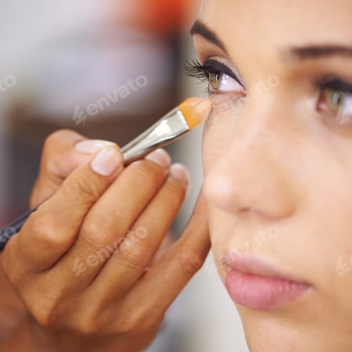 Preview: Brining out the best for that special occasion. A young woman having makeup applied.
