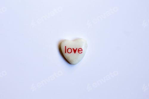 Preview: The word love on a small rock