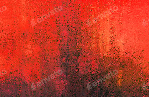 Preview: abstract background of red wet glass. Water droplets fogged glass surface,