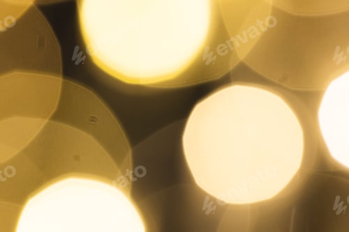 Preview: Multiple yellow bokeh lights with copy space on dark background