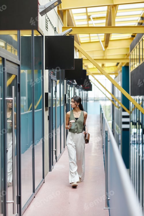 Preview: Woman in Formal Clothing Walking Cup towards Office Room in Business Building