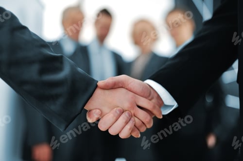 Preview: Handshake In Front Of Business People