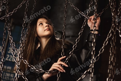 Preview: Lovely classy teen girl model 13-14 year in retro style image in dark industrial room