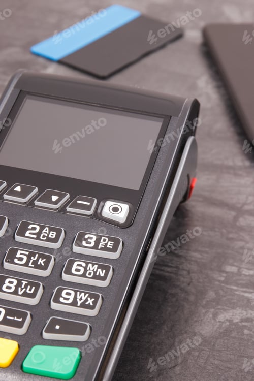 Preview: Payment terminal with credit card and mobile phone. Cashless paying for shopping. Finance concept