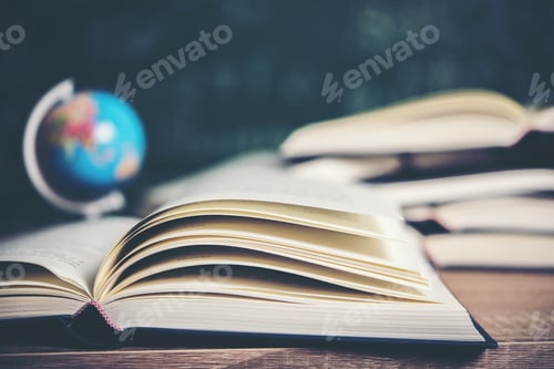 Preview: Open book with green board background